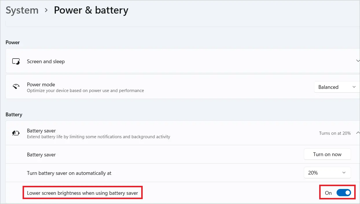 Lower screen brightness when using battery saver